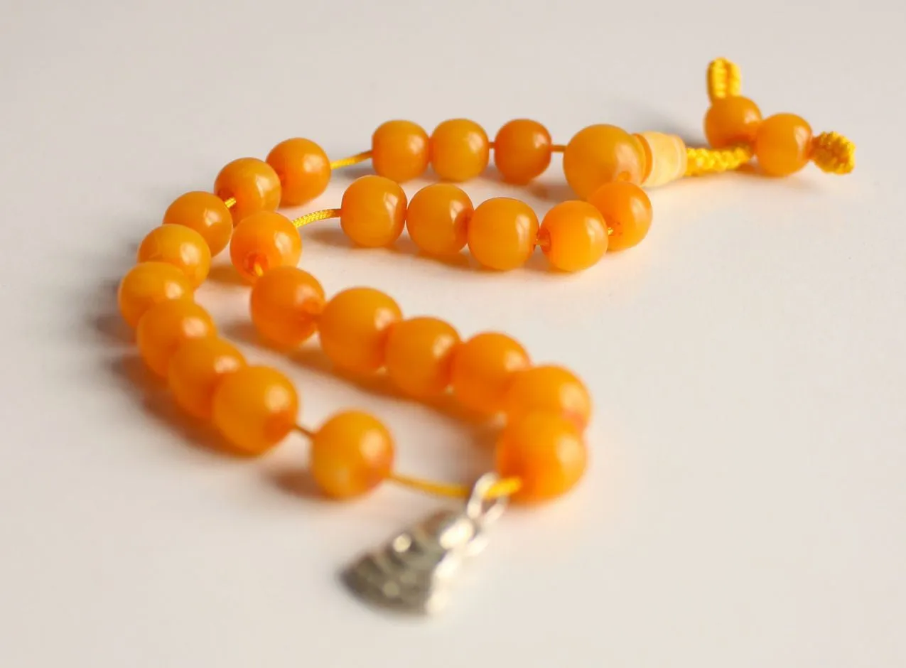 Faux Amber Wrist Mala with Buddha Charm