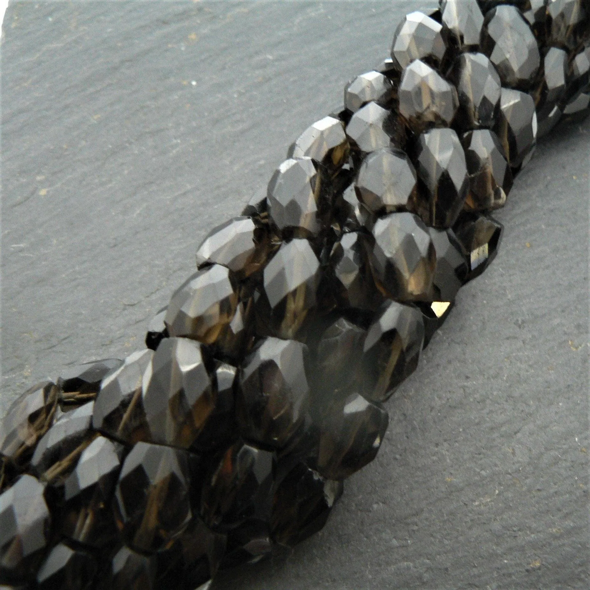 Smoky Quartz Faceted Oval Beads 15" Strand